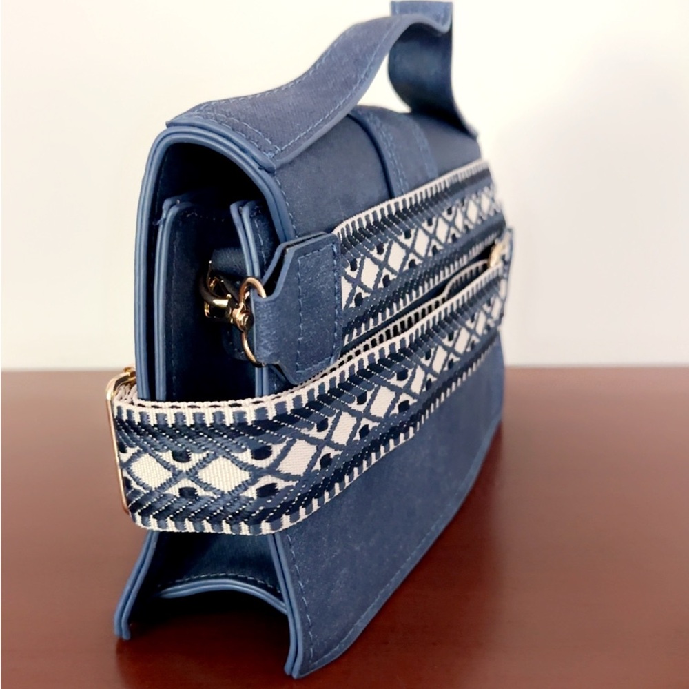 Stylish Blue Handbag with Patterned Strap